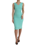 Robe midi sans manches Dolce & Gabbana en viscose verte, coupe bodycon élégante et ajustée, portée sans accessoires.
