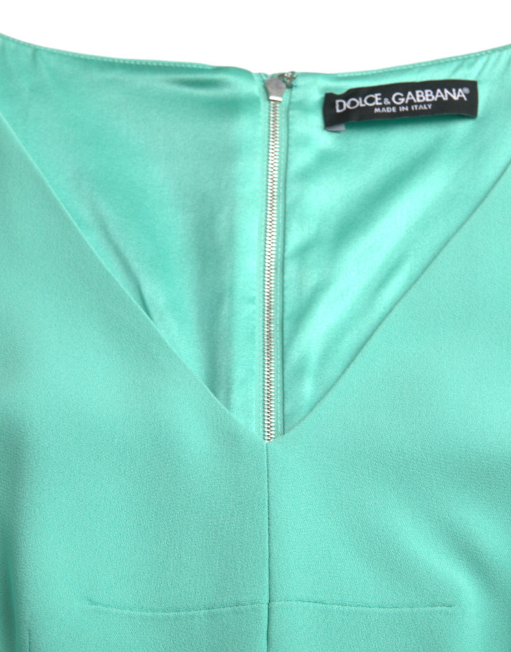 Robe midi sans manches en viscose verte de Dolce & Gabbana, coupe bodycon élégante et ajustée.
