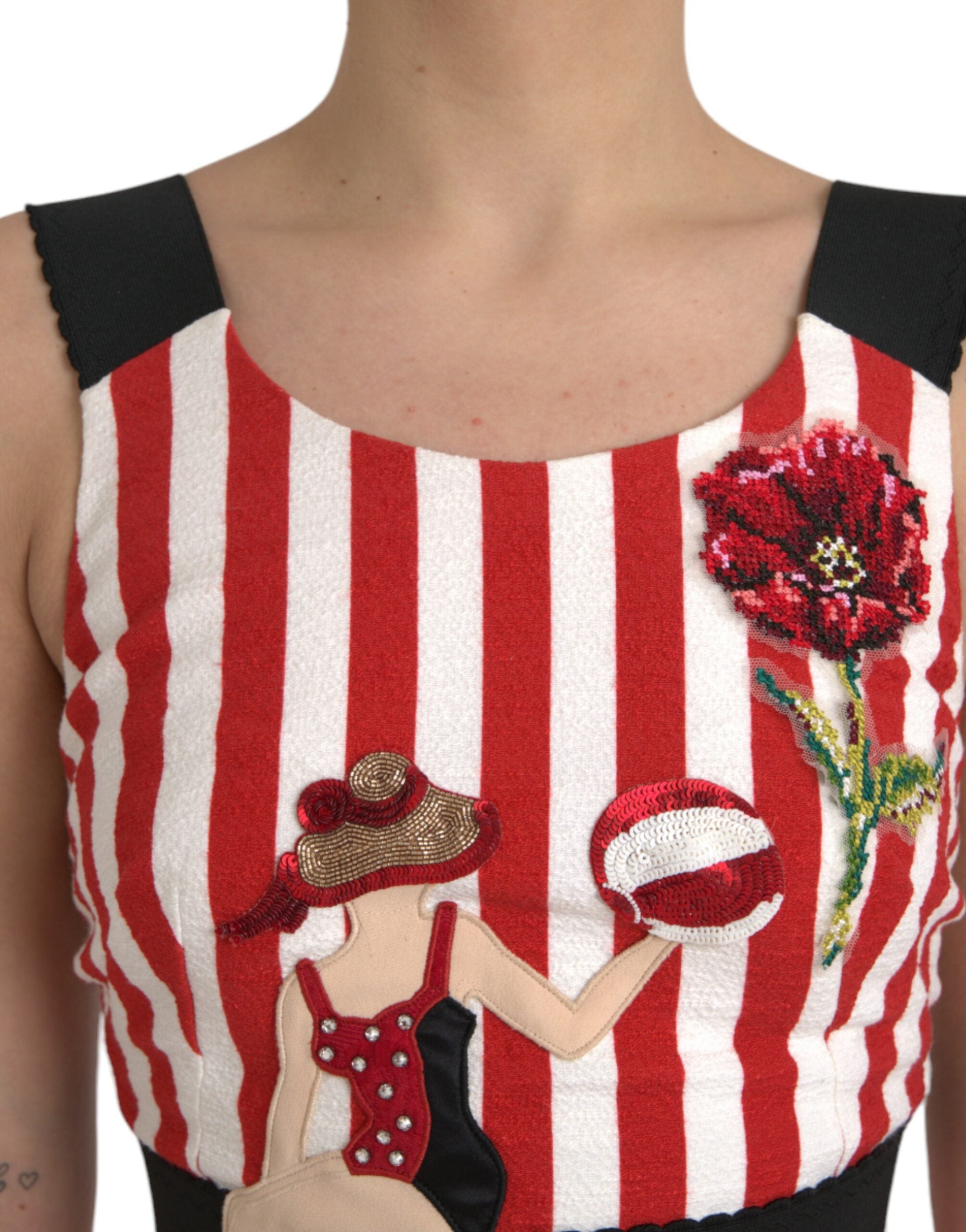 Robe midi sans manches Dolce & Gabbana rouge et blanche à fleurs, coupe fluide et élégante, pour femme.