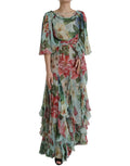 Robe longue à fleurs bleues Dolce & Gabbana avec jupe à plusieurs couches et style élégant.