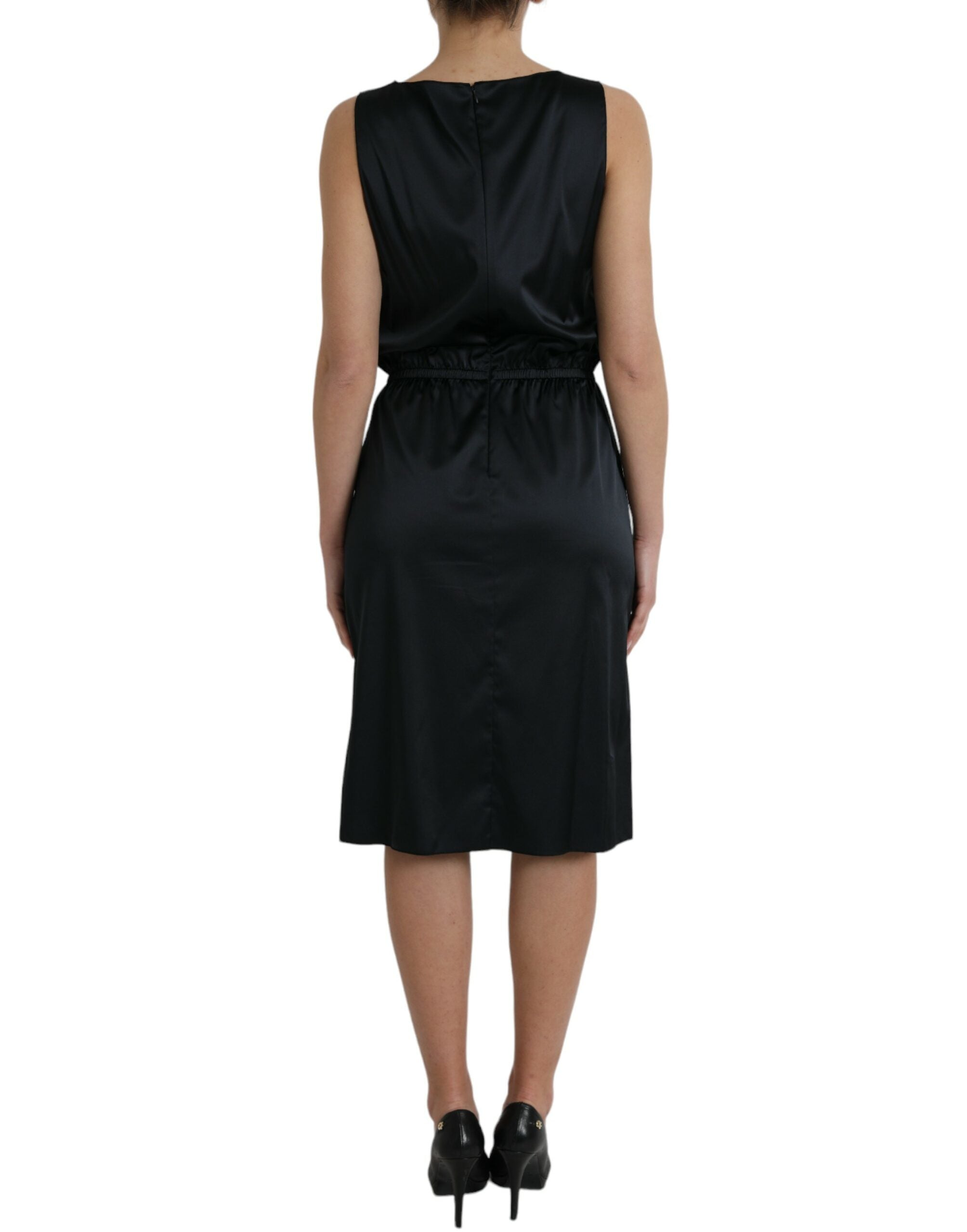 Robe midi noire en polyester avec bordure en dentelle, robe ajustée de la marque Dolce & Gabbana, vue de face.