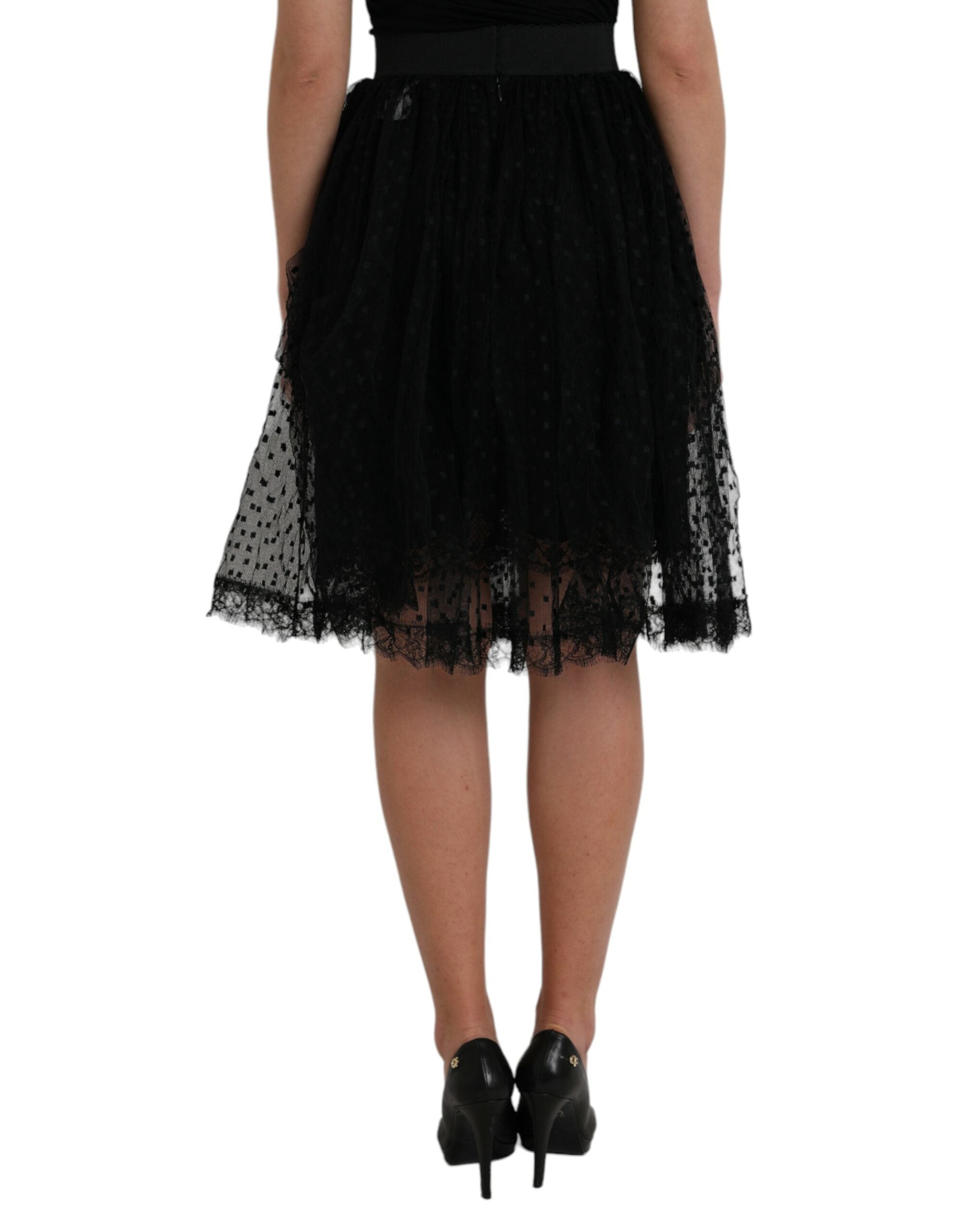 Jupe en nylon noir Dolce & Gabbana à taille haute avec ourlet en dentelle et coupe évasée.