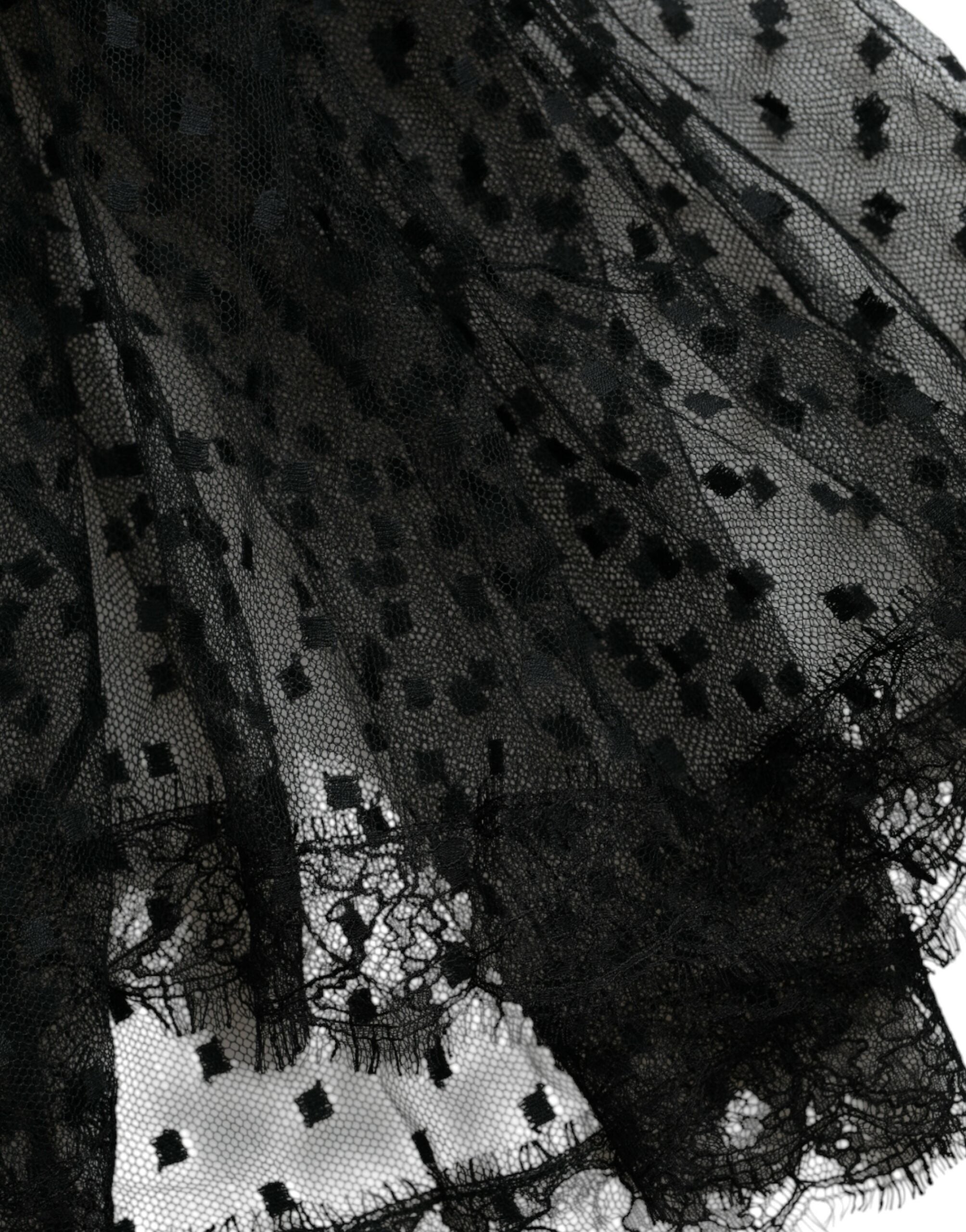 Jupe longue noire en nylon avec broderie en dentelle à taille haute et coupe évasée, de la marque Dolce & Gabbana.