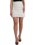 Jupe courte blanche à fleurs de style A-line Dolce & Gabbana, tissu léger et motif floral élégant.