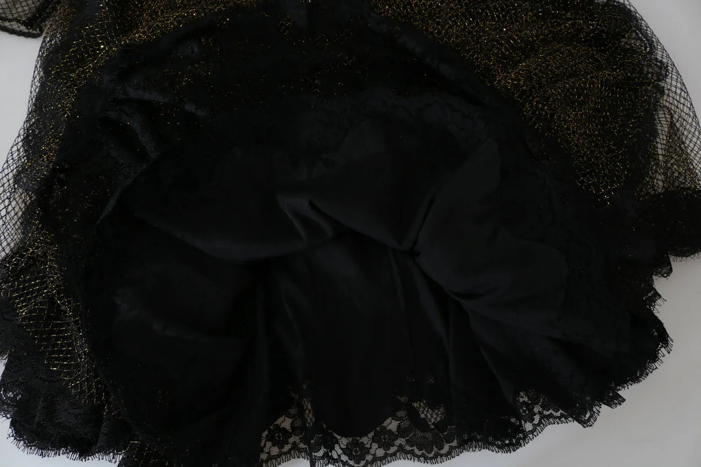 Robe Dolce & Gabbana noire et or avec cœur en cristal, coupe évasée, élégante robe de soirée à motif A-line.