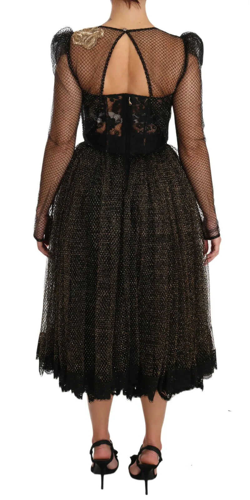 Robe trapèze noire et or avec cœurs en cristal de Dolce & Gabbana, élégante et sophistiquée.