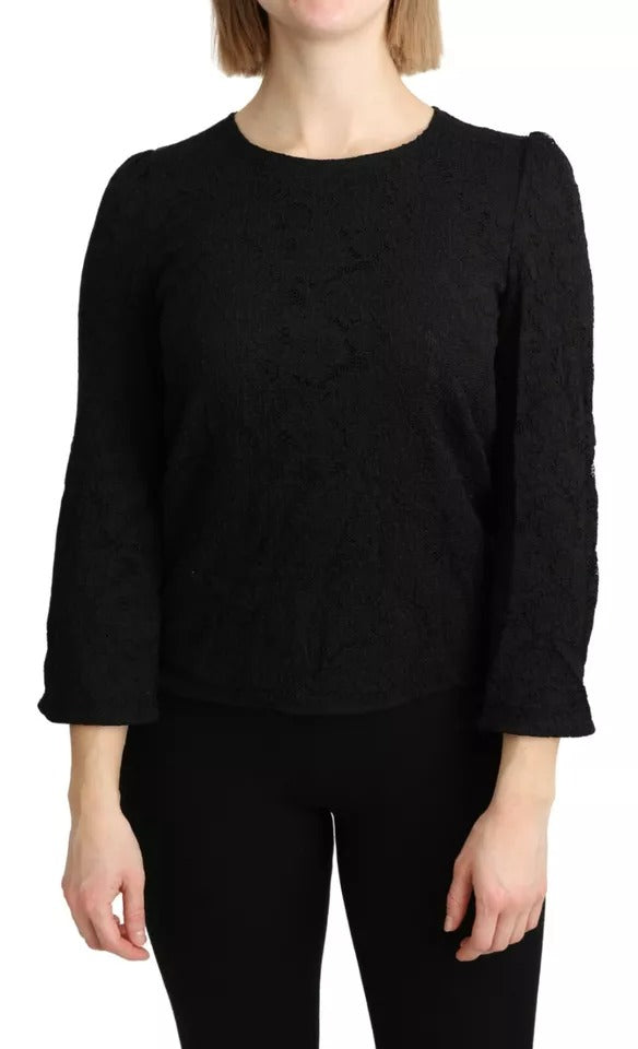 Blouse noire Dolce & Gabbana en dentelle à manches longues, style élégant et sophistiqué.
