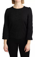 Blouse en dentelle noire Dolce & Gabbana à manches longues, style élégant et sophistiqué, vue de face.