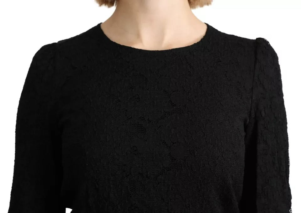 Blouse noire en dentelle à manches longues de Dolce & Gabbana, style élégant et sophistiqué.