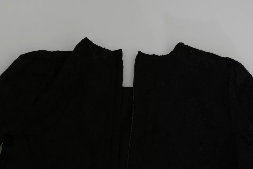 Blouse Dolce & Gabbana en dentelle noire à manches longues, style élégant et sophistiqué pour femme.