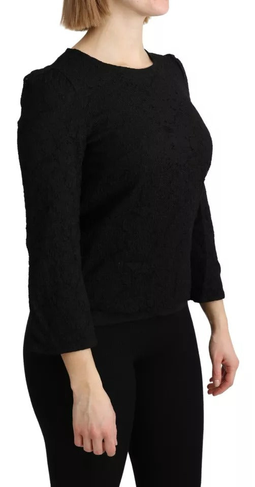 Blouse noire en dentelle à manches longues de Dolce & Gabbana, style élégant et sophistiqué, vue de face.