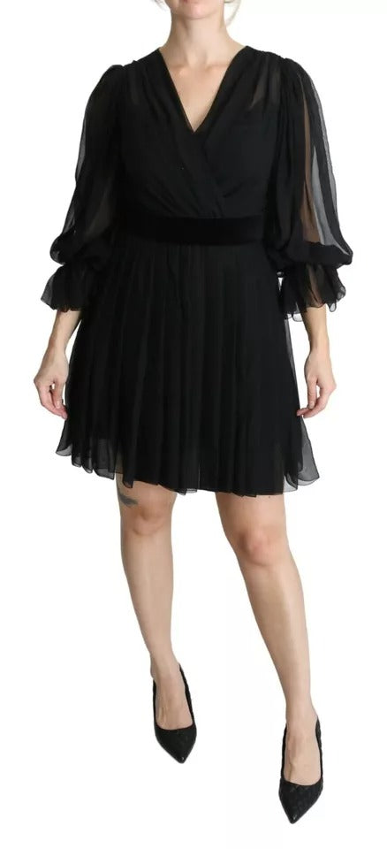 Robe courte en mesh noir à plis en soie mélangée de Dolce & Gabbana, avec design élégant et détail plissé visible.