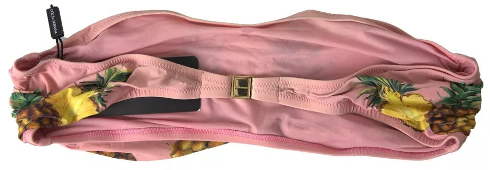 Top de bikini imprimé rose de Dolce & Gabbana, maillot de bain pour la plage, style élégant et tendance.