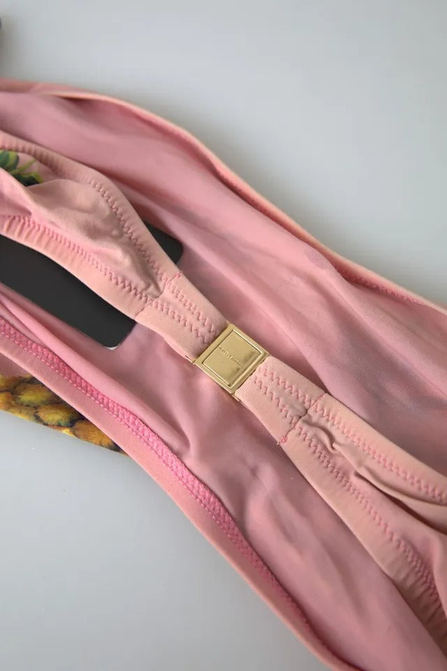 Bikini rose Dolce & Gabbana à imprimé floral, haut de maillot de bain pour plage en tissu léger et coloré.
