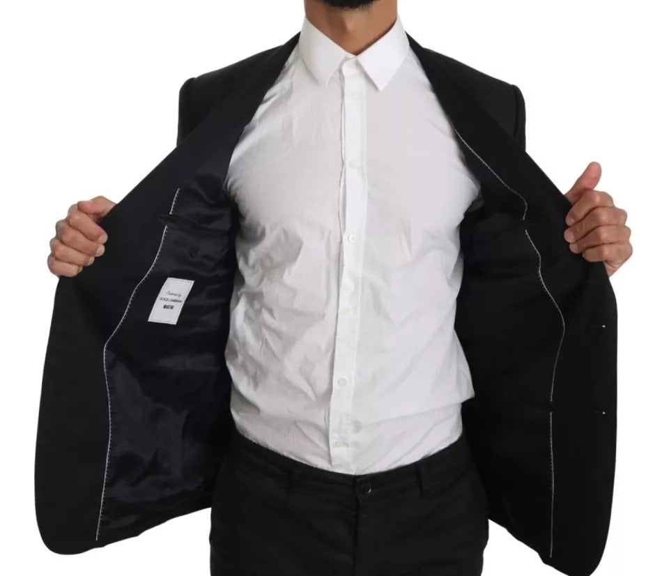 Veste blazer noire Dolce & Gabbana Slim Martini, coupe élégante, tissu de qualité, portée sur un mannequin.