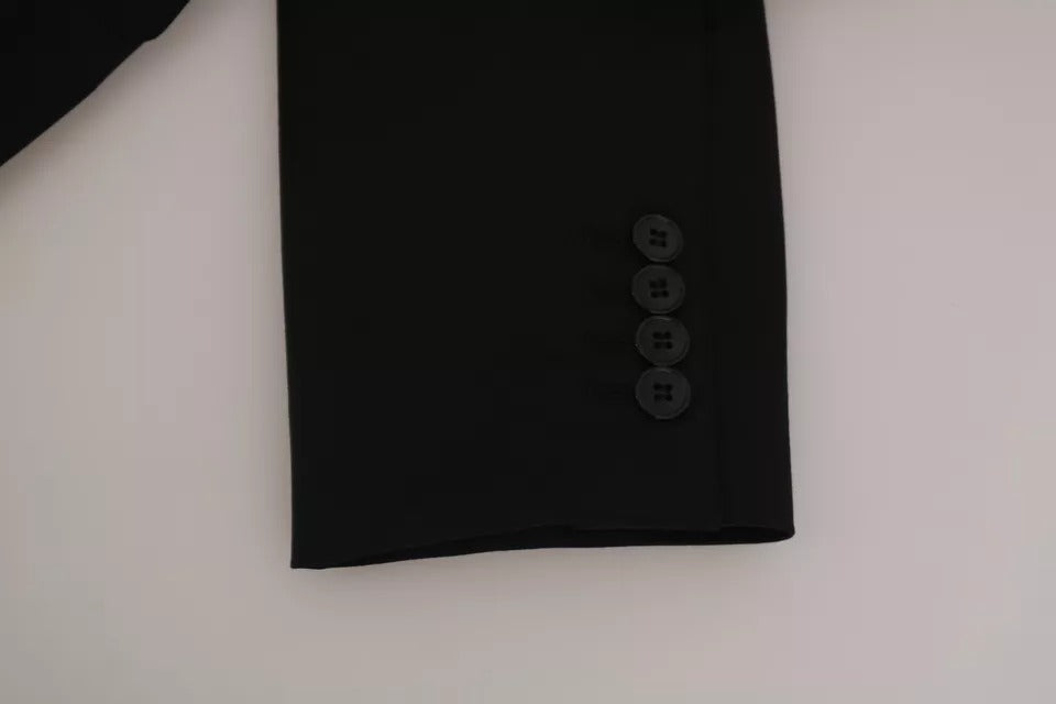 Veste blazer slim noire Dolce & Gabbana pour homme, coupe élégante et moderne, visible sur fond neutre.