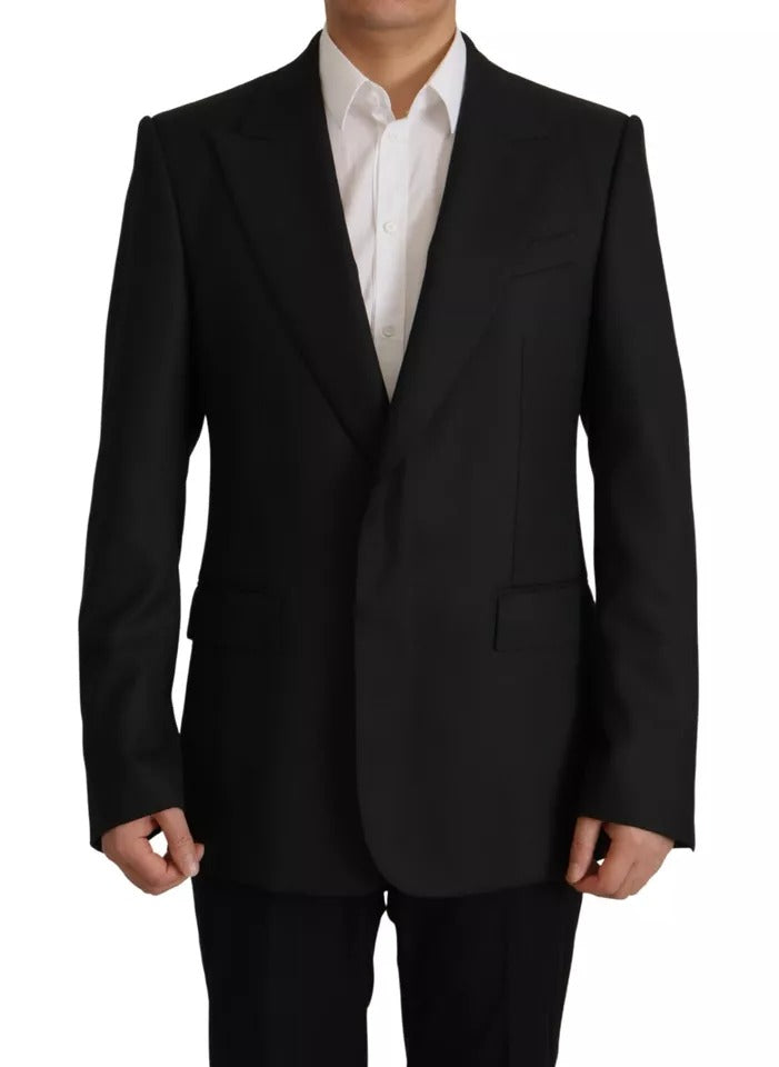 Veste blazer noire en polyester de Dolce & Gabbana, à simple boutonnage, vue de face sur mannequin.