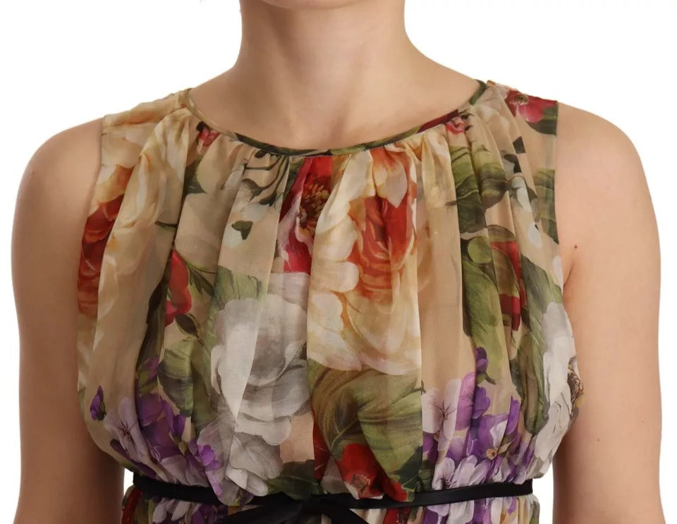 Robe courte beige sans manches Dolce & Gabbana à fleurs, col rond et style élégant.