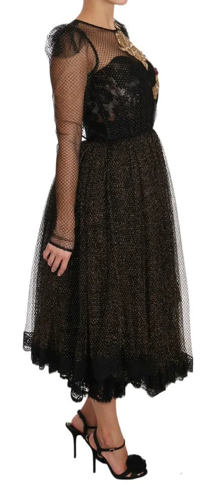 Robe A-line noire et or avec cœur en cristal de Dolce & Gabbana, élégante et sophistiquée, visible en photo.