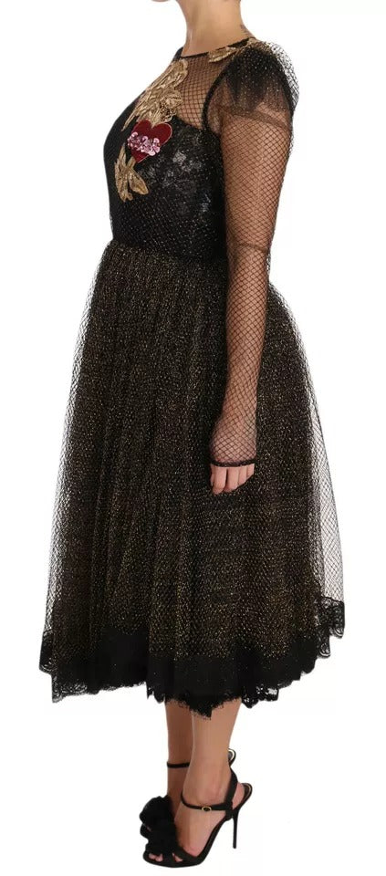 Robe longue noire en satin Dolce & Gabbana avec cœur en cristal doré et ornement A-line, élégante et sophistiquée.