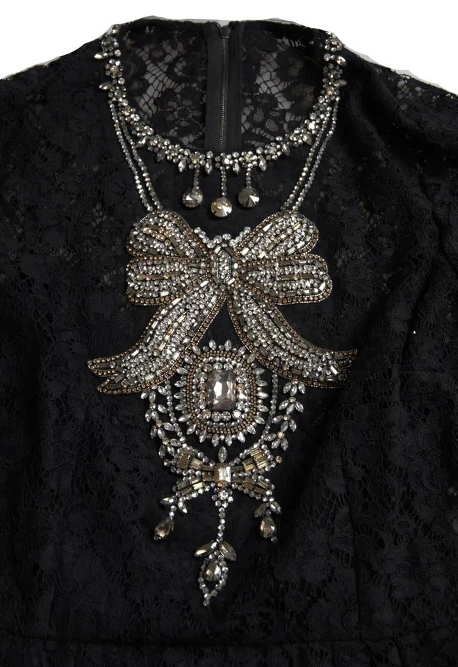 Robe noire en nylon avec dentelle et embellissements de Dolce & Gabbana, coupe ajustée et élégante.