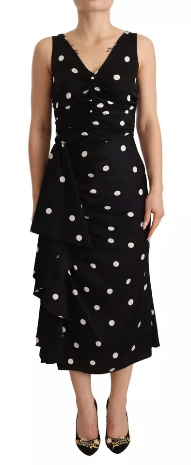 Robe midi en soie noire à pois Dolce & Gabbana, coupe ajustée, encolure en V, élégante et sophistiquée.