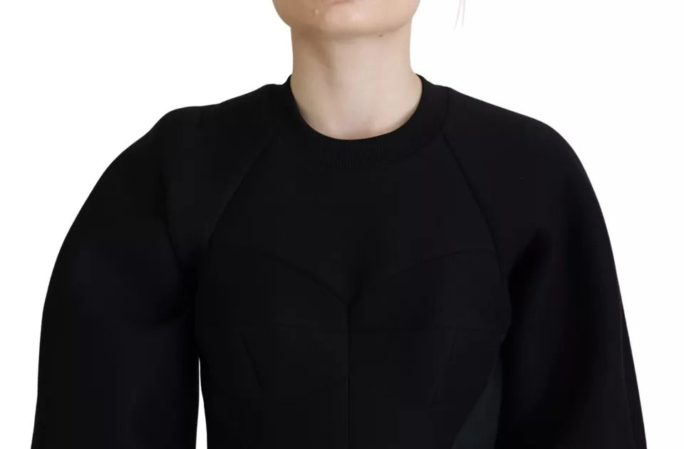 Robe courte en coton noire à manches longues de Dolce & Gabbana, style évasé et coupe en A, détail classique et élégant.