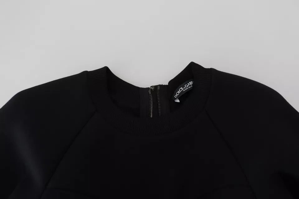 Robe courte noire en coton à manches longues de style A-line Dolce & Gabbana, silhouette élégante et moderne.