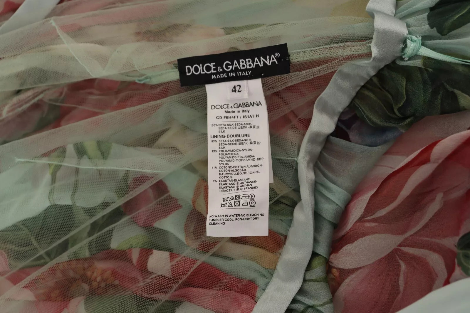 Robe longue midi florale verte Dolce & Gabbana à manches longues et col en V, élégante et féminine.