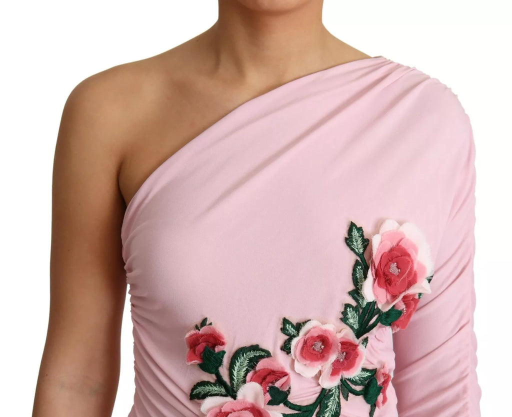 Robe rose à une épaule Dolce & Gabbana avec embellissements floraux, tissu élégant et design sophistiqué.