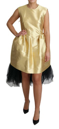 Robe sans manches en tulle doré en polyester de Dolce & Gabbana, coupe A-line élégante, idéale pour des occasions sophistiquées.