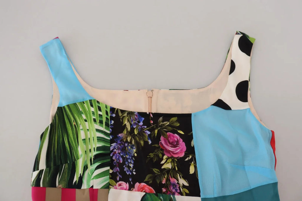 Robe longue en soie multicolore Dolce & Gabbana avec patchwork, coupe ajustée et élégante, portée de style raffinée.
