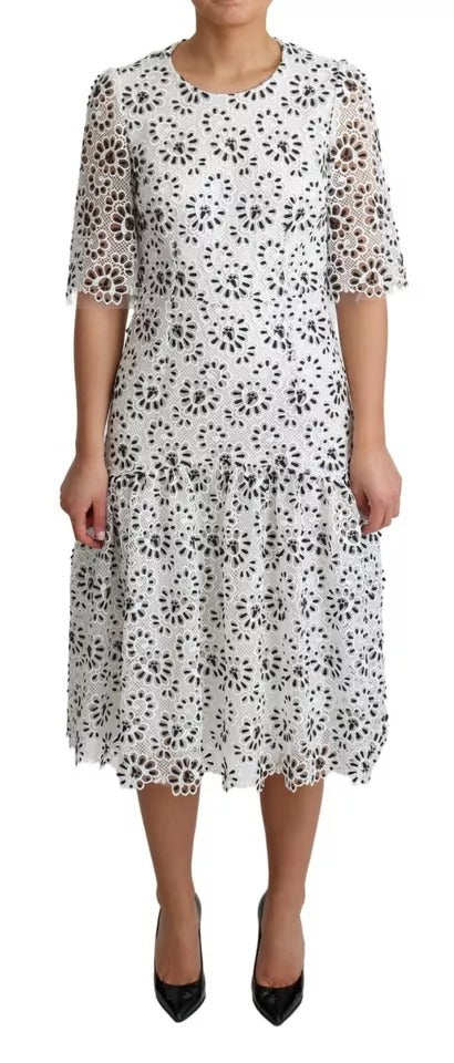 Robe midi blanche Dolce & Gabbana en polyester avec découpe design et coupe évasée élégante.
