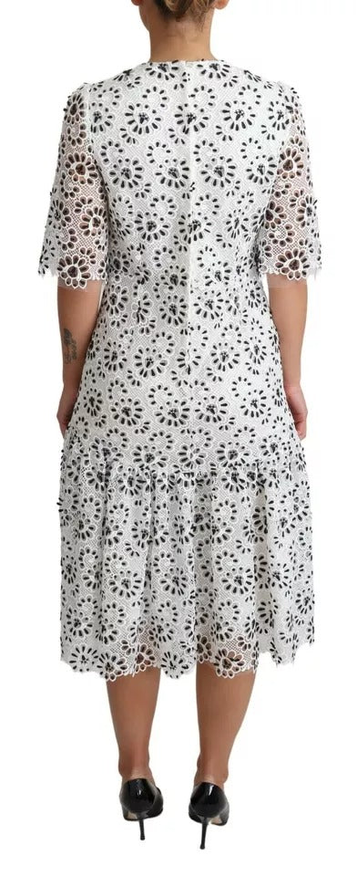 Robe midi en polyester blanc Dolce & Gabbana avec découpe, design en A-line, vue de face sur mannequin.