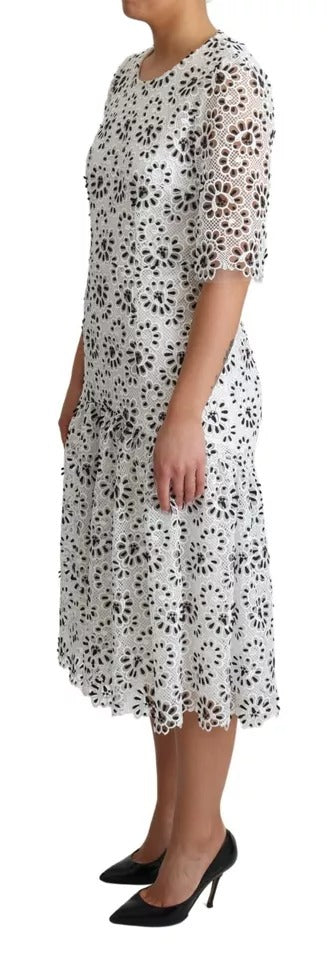 Robe midi blanche Dolce & Gabbana en polyester avec découpe design, coupe en A élégante et moderne.