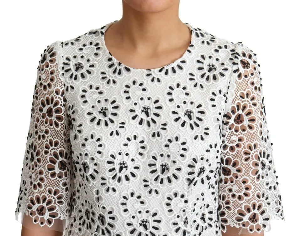 Robe midi en polyester blanche Dolce & Gabbana avec design découpé et coupe évasée, élégante et sophistiquée.
