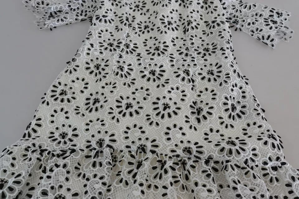 Robe midi blanche en polyester avec découpes, design A-line par Dolce & Gabbana, vêtement élégant pour femmes.