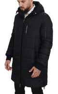 Imperméable noir Dolce & Gabbana en nylon avec capuche, parka d'hiver élégante et chaude, vue de face sur fond neutre.