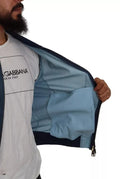 Veste en cuir perforé bleu Dolce & Gabbana avec fermeture éclair complète, vue de face.