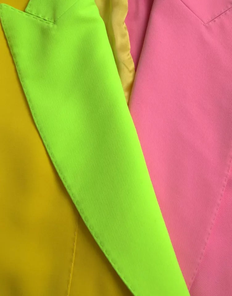Manteau Dolce & Gabbana à patchwork multicolore avec revers crantés et col en pointe, mode élégante et sophistiquée.
