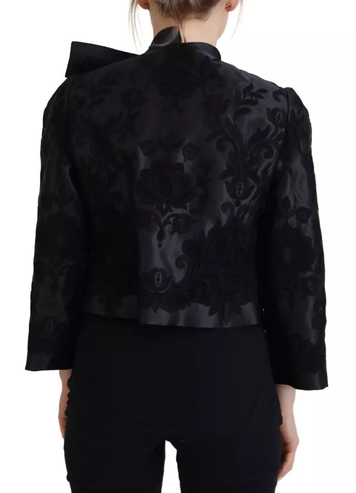 Veste en organza de soie noire avec corset en dentelle transparente Dolce & Gabbana, look élégant et sophistiqué.