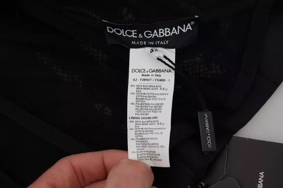Veste en organza de soie noire avec corset en dentelle transparente Dolce & Gabbana, élégante et sophistiquée.