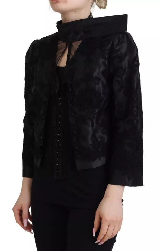 Veste en soie et organza noire Dolce & Gabbana avec corset en dentelle transparente et détails élégants.