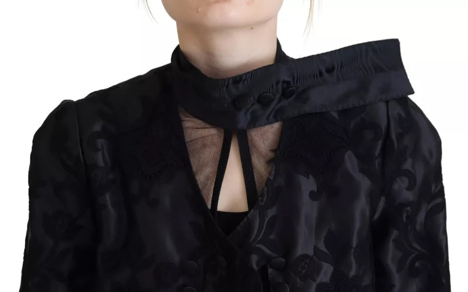 Veste en soie transparente en organza avec corset en dentelle noire de Dolce & Gabbana.