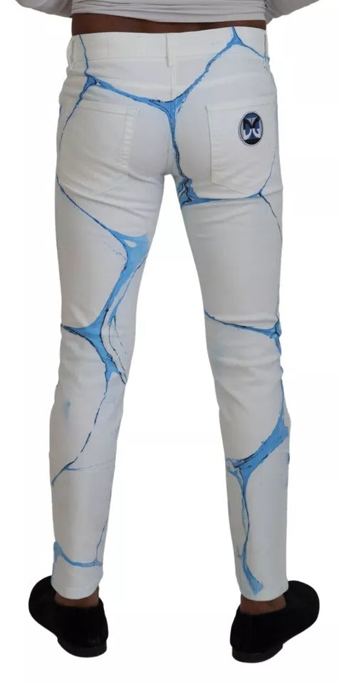 Jeans skinny en coton blanc et bleu de Dolce & Gabbana, denim ajusté avec détails modernes et finition soignée.
