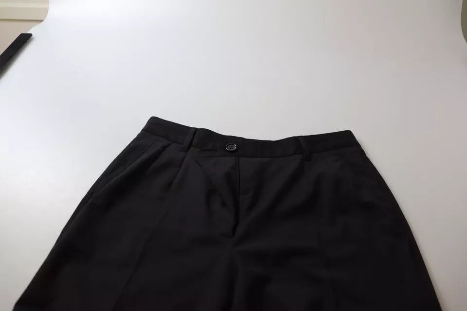 Pantalon noir à taille haute et coupe tapered de Dolce & Gabbana, pantalon élégant en tissu fluide.