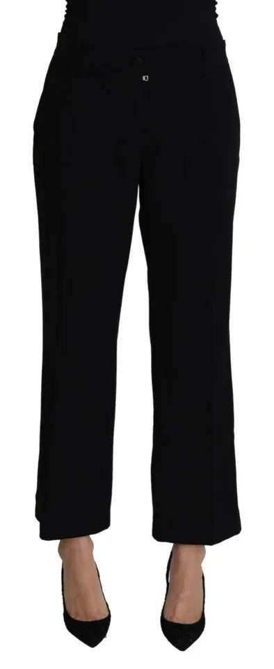Pantalon Capri en laine noire stretch de Dolce & Gabbana, coupe courte et ajustée, vue de face.