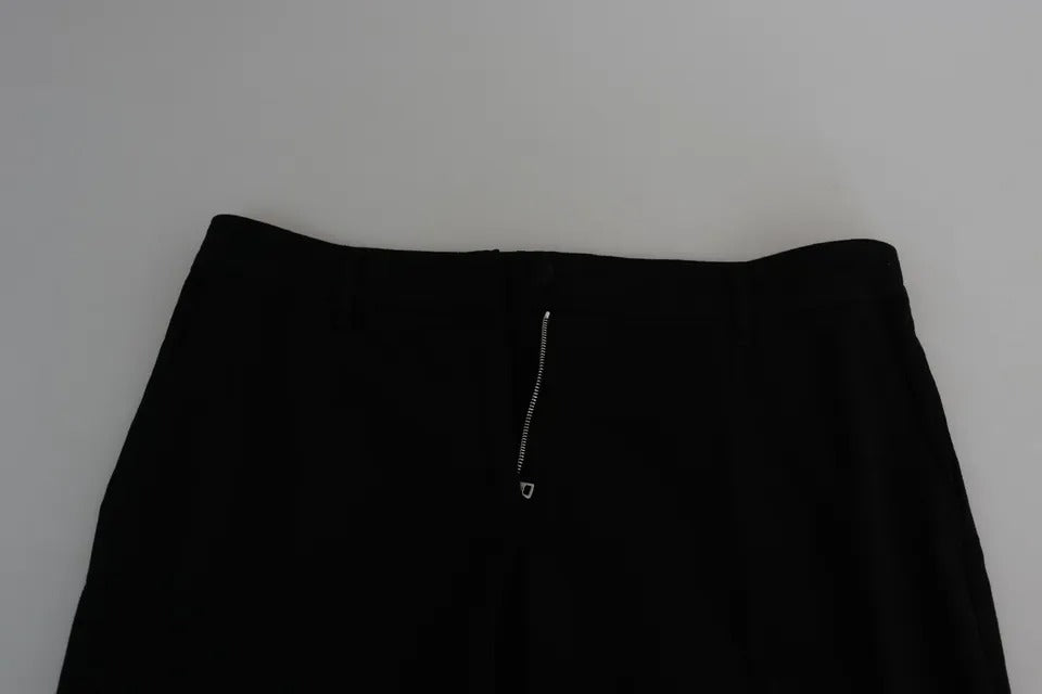 Pantalons Capri noirs en laine extensible de Dolce & Gabbana, coupe courte, style élégant et ajusté.