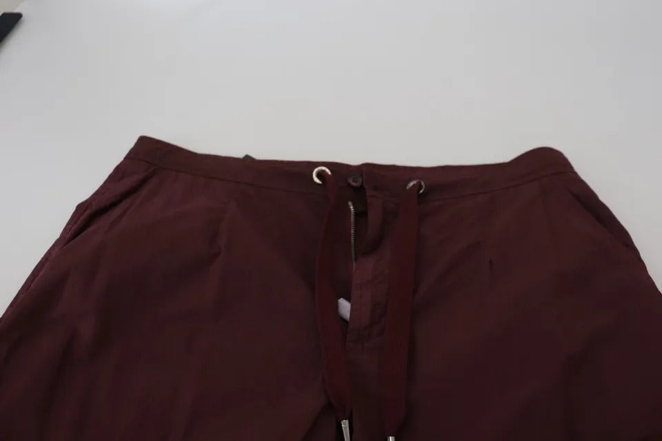 Pantalon cargo Dolce & Gabbana Bordeaux en coton avec poches et coupe décontractée, style jogger, vue de face.