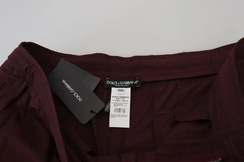 Pantalons cargo Dolce & Gabbana Bordeaux en coton, style jogger avec poches et coupe décontractée, vue de face.